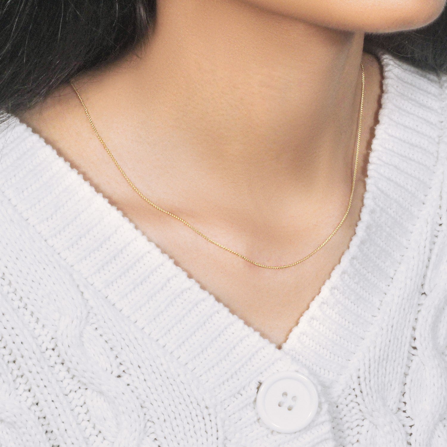 14k Yellow Gold Round Wheat Chain (0.80 mm) in a sleek high-contrast midnight luxury editorial style